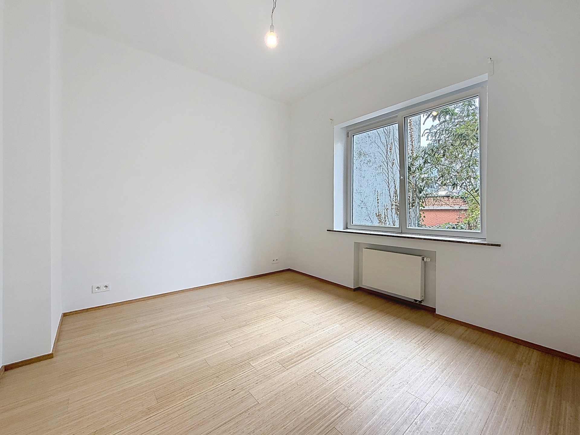 Foto 1 van 4 van Gelijkvloerse verdieping met twee slaapkamers in Etterbeek
